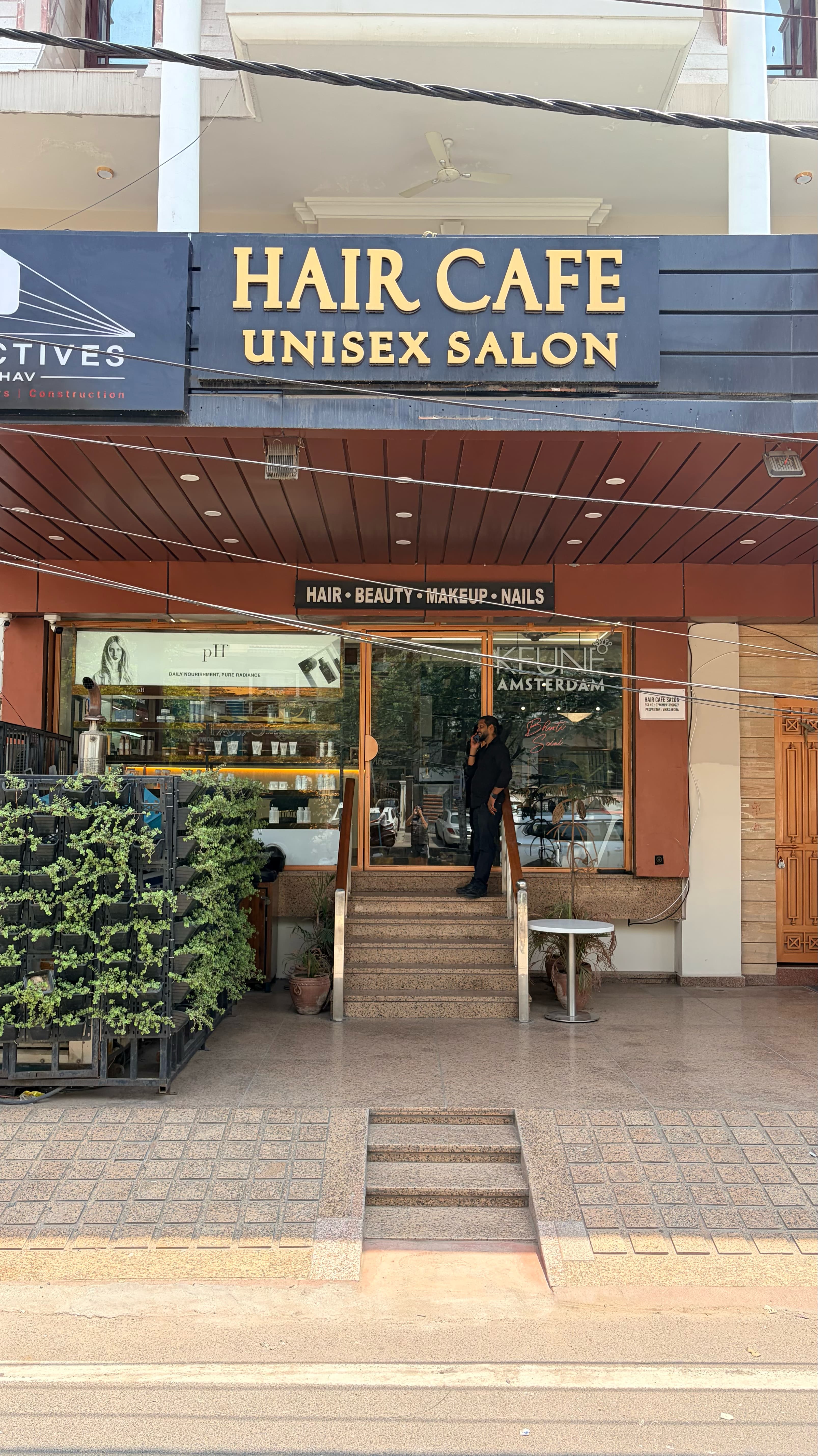 Hair Cafe Unisex Salon storefront and entrance