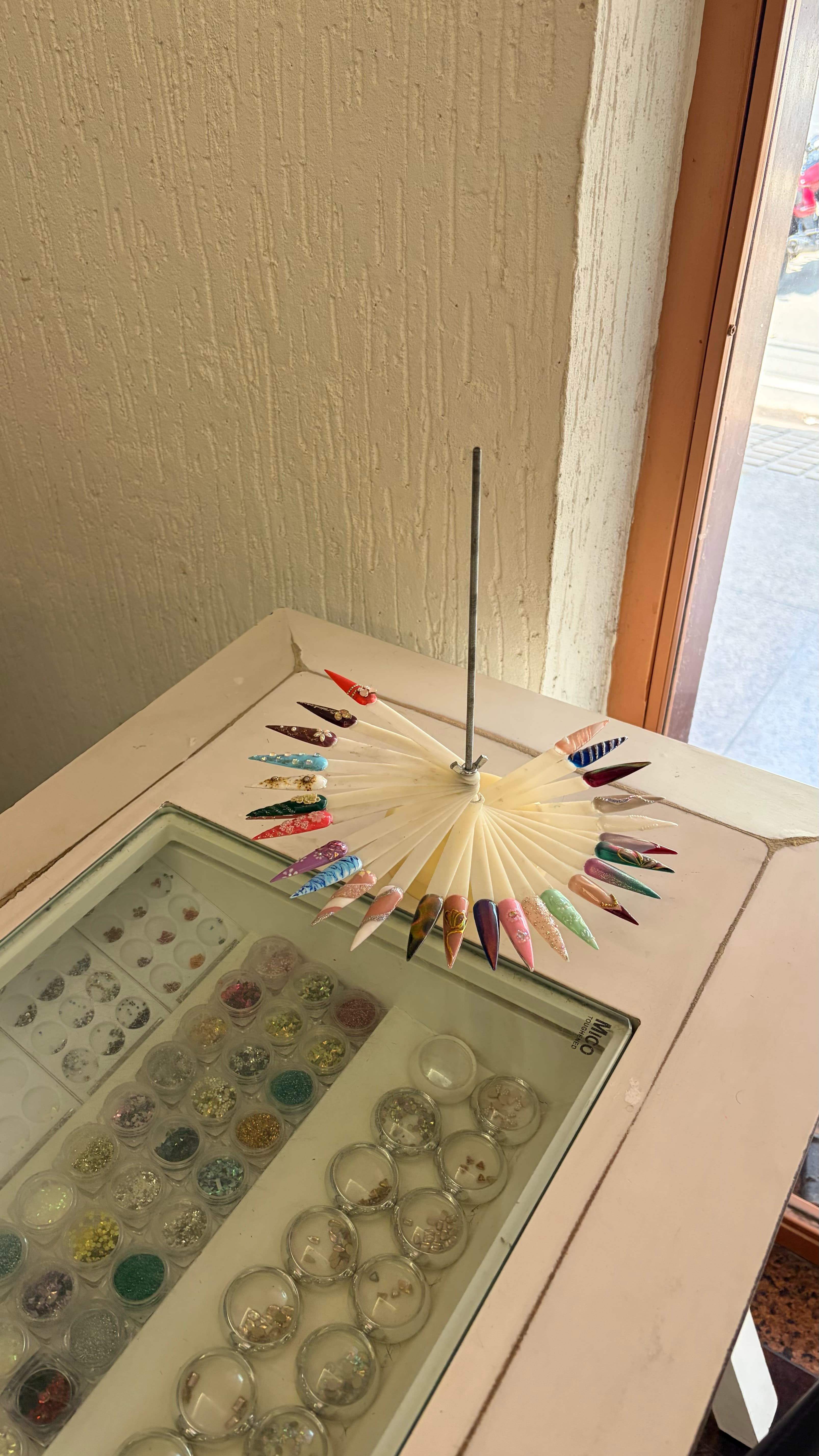 Hair Cafe Unisex Salon nail art display